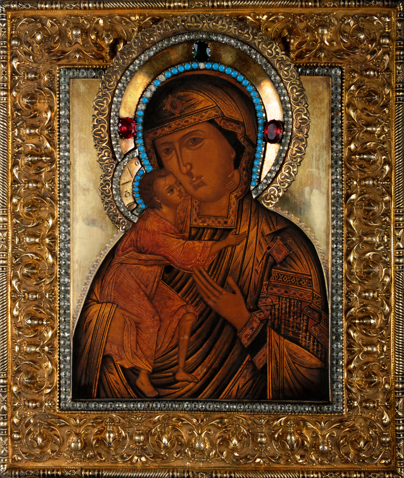 Kultareunuksinen ikoni, jossa kuvattuna Jeesus-laspi sekä Maria.